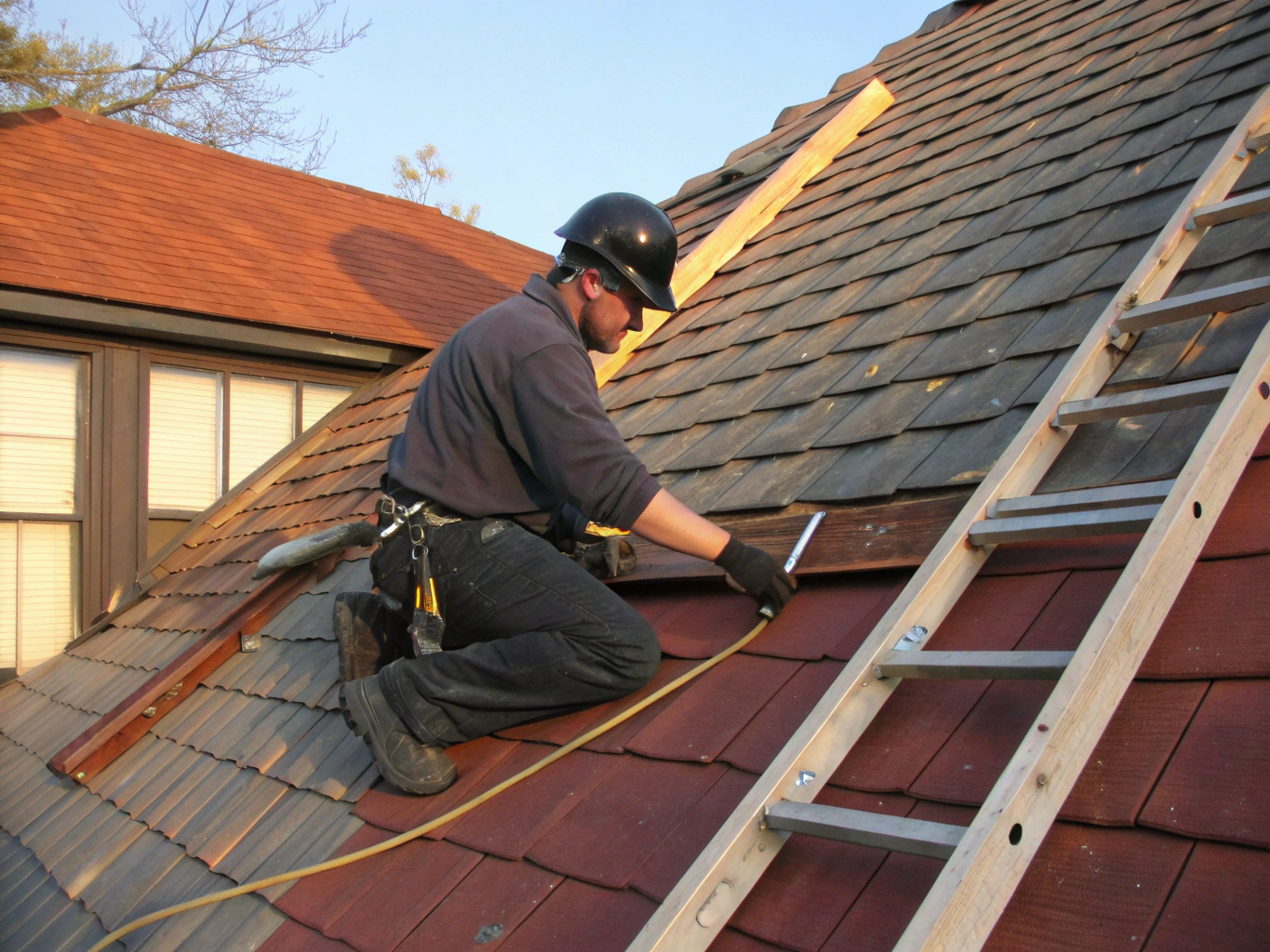 Expert technician repairing roof flashing around a chimney