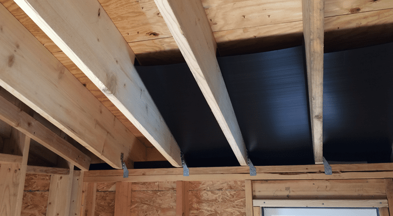Extra large custom attic air intake baffles installed between rafters